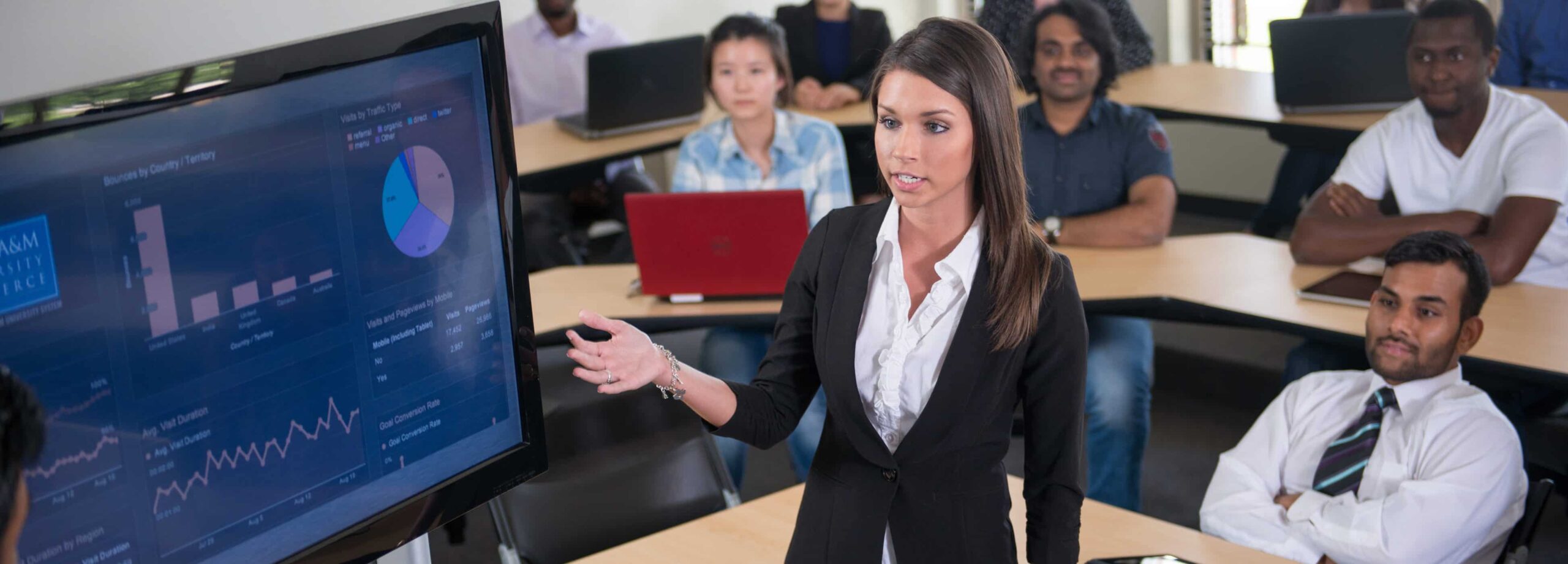 professor explaining stats to teacher