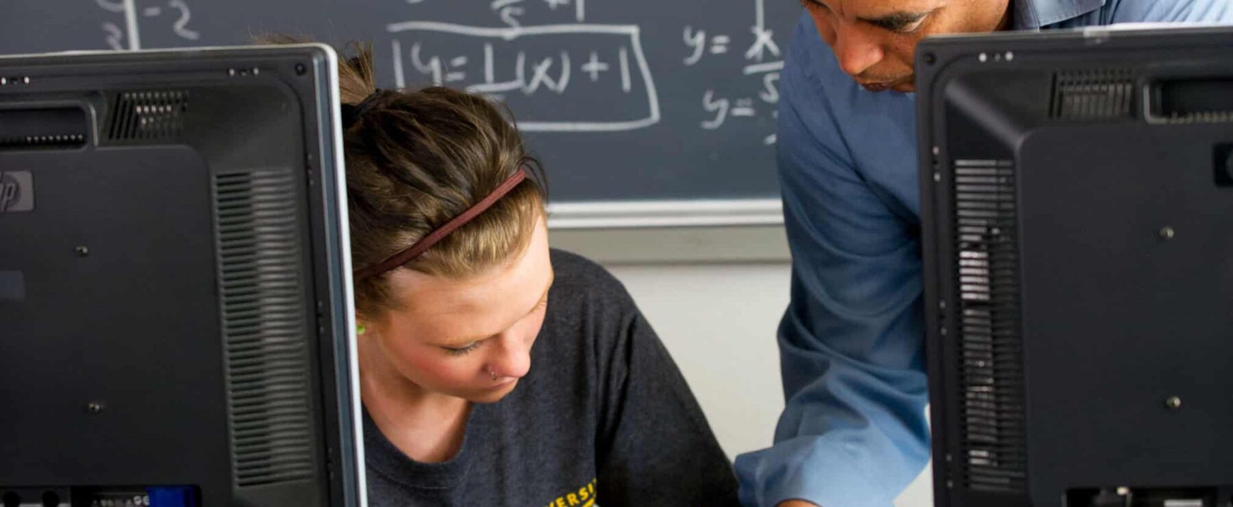 Mathematics professor and student working together
