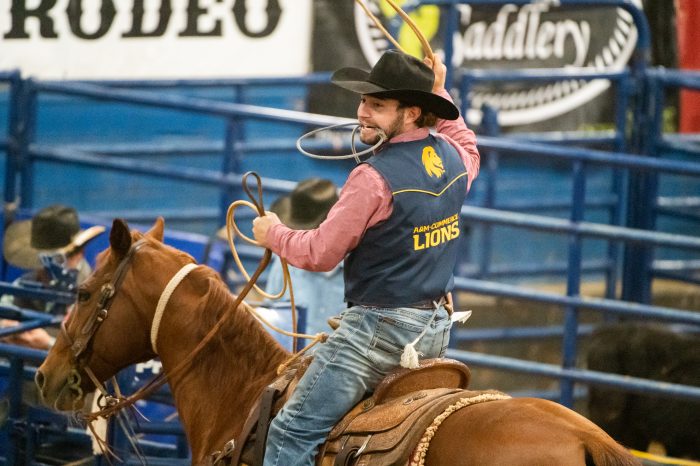 A male leo student on a horse.