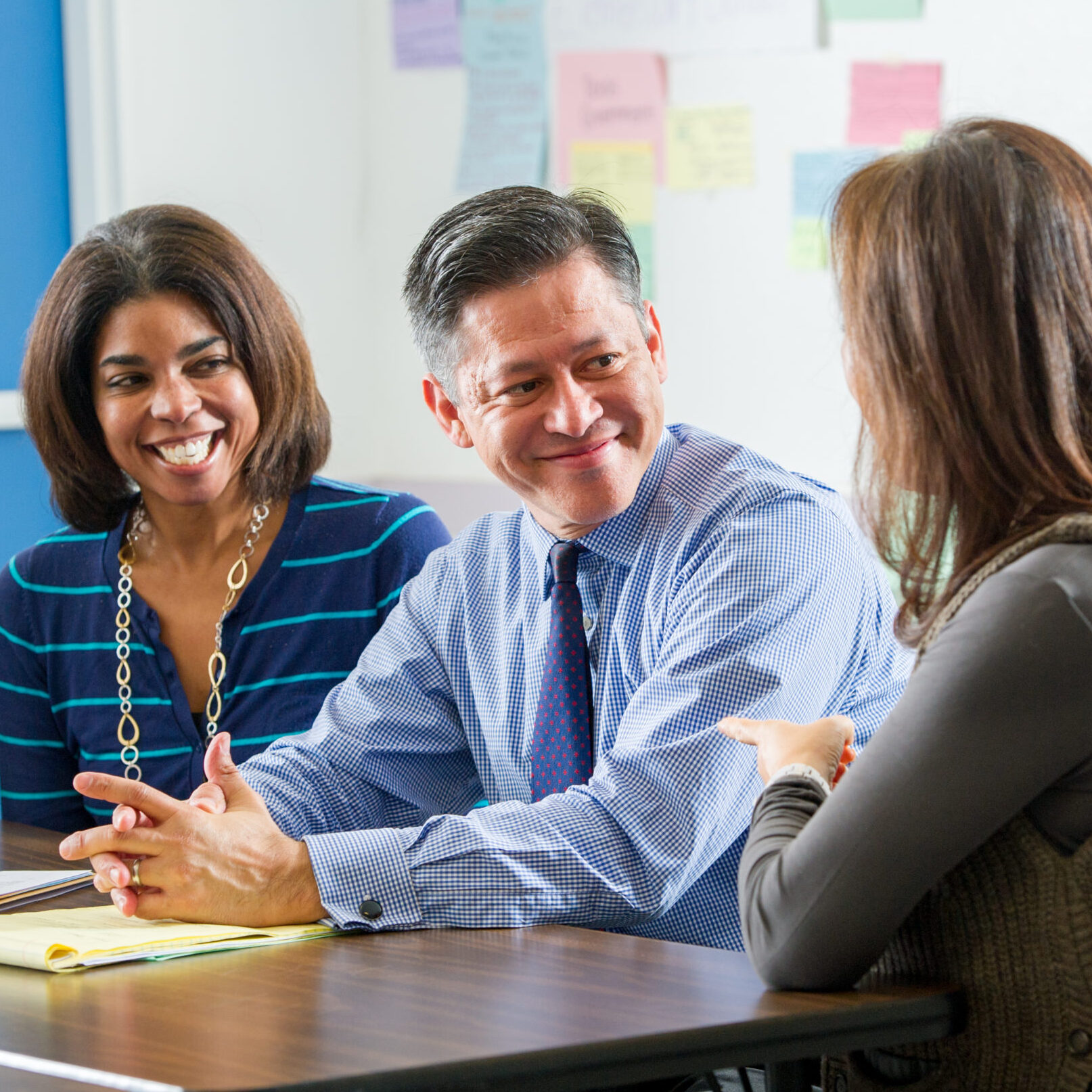 People talking at a table.