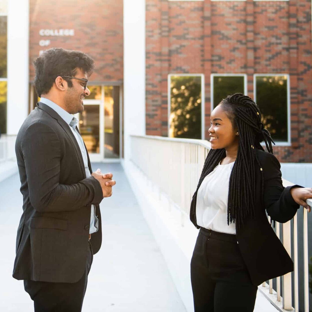 Students interacting to each other outside BA building