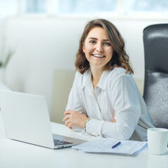 Young woman in office working