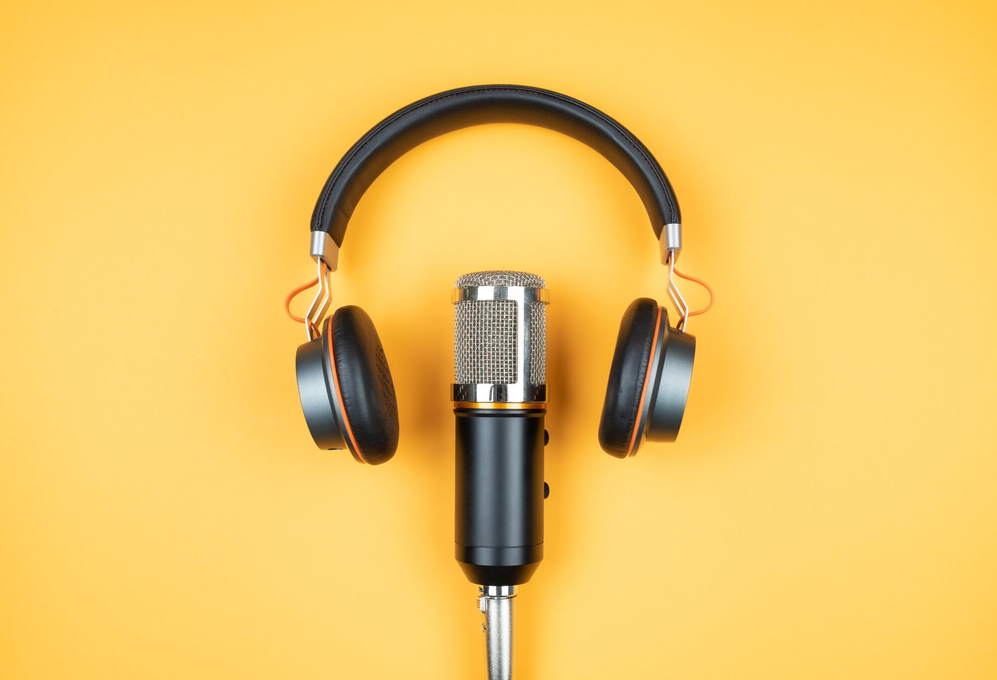 Headphones over a microphone
