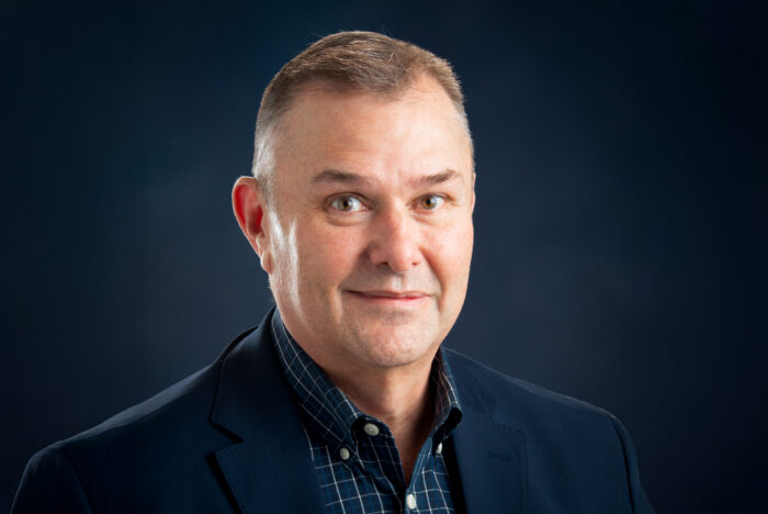 A headshot photo of a person.