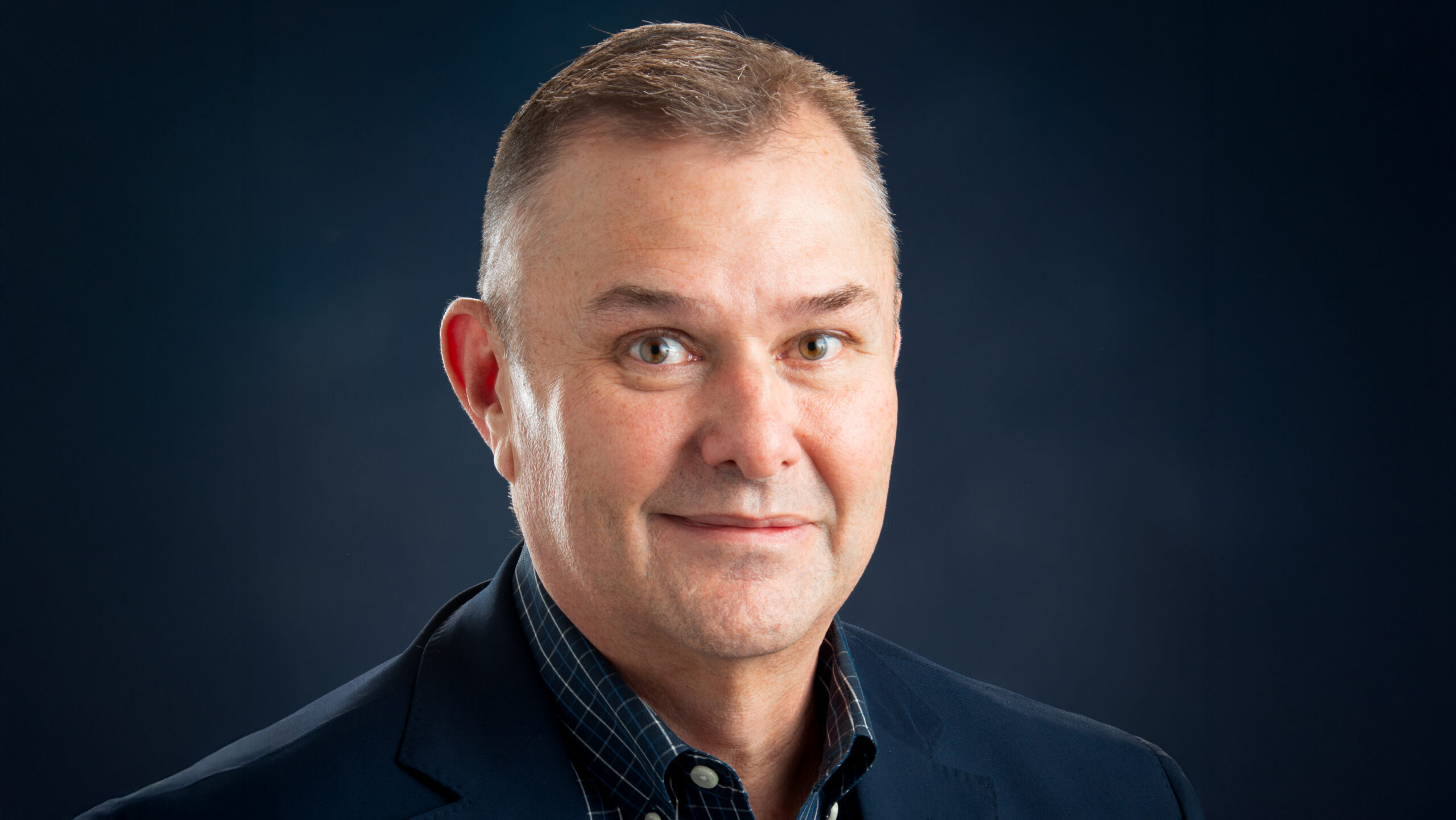 A headshot photo of a person.