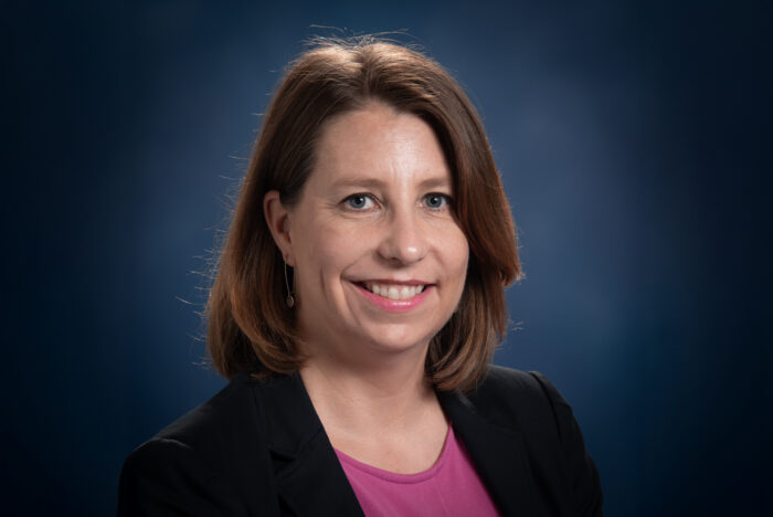 A headshot photo of a person