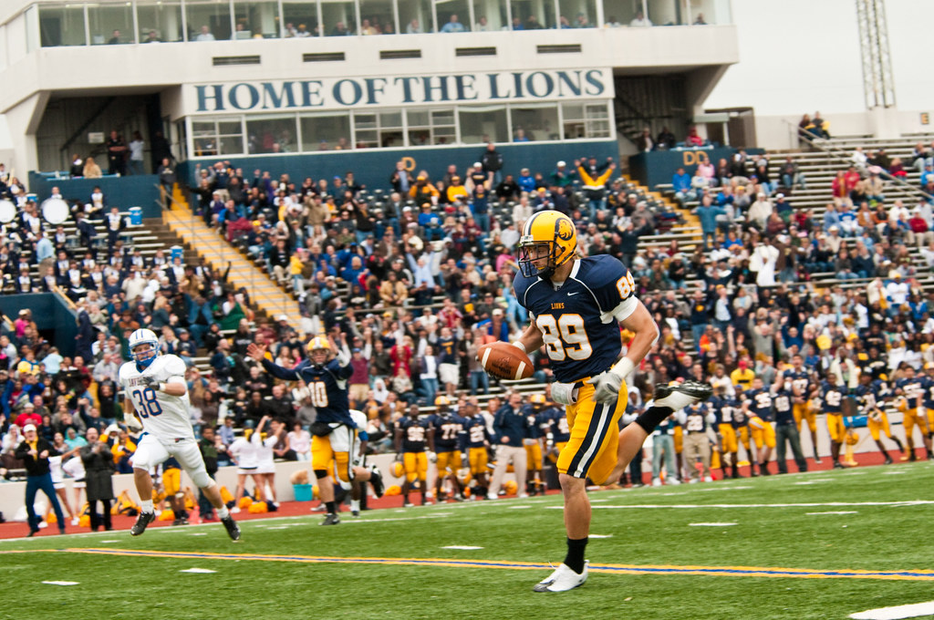 A football player running with the ball.