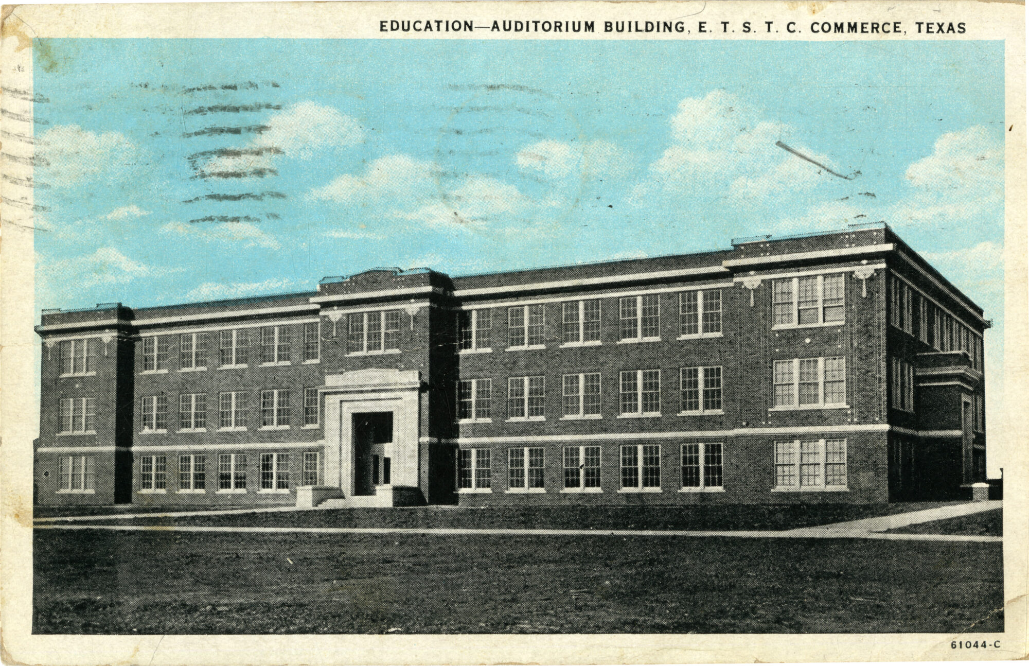 A vintage postcard showing the Education Auditorium Building at ETSTC