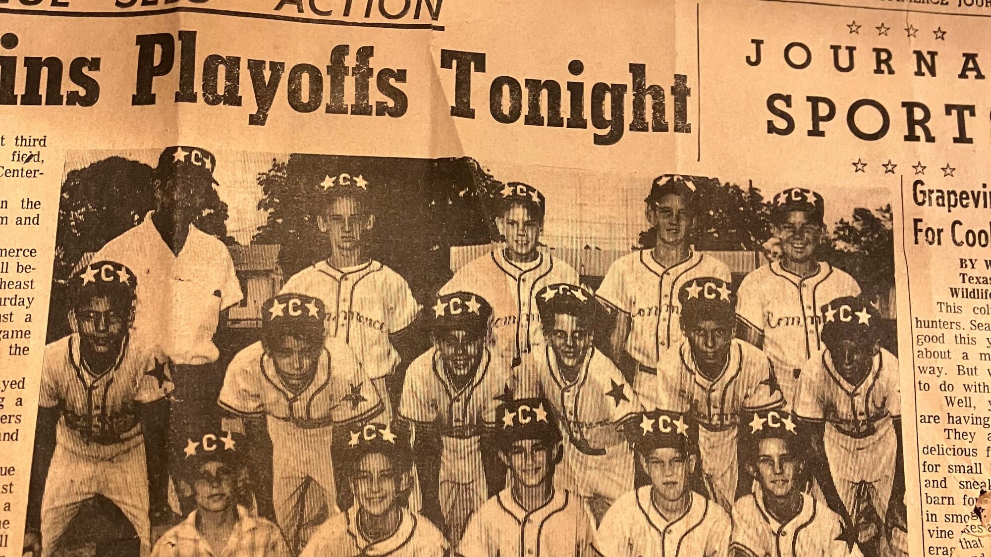A newspaper clipping, yellow with age, shows a group photo of a Little League baseball team. The boys are wearing baseball caps with "C" on them and baseball uniforms.