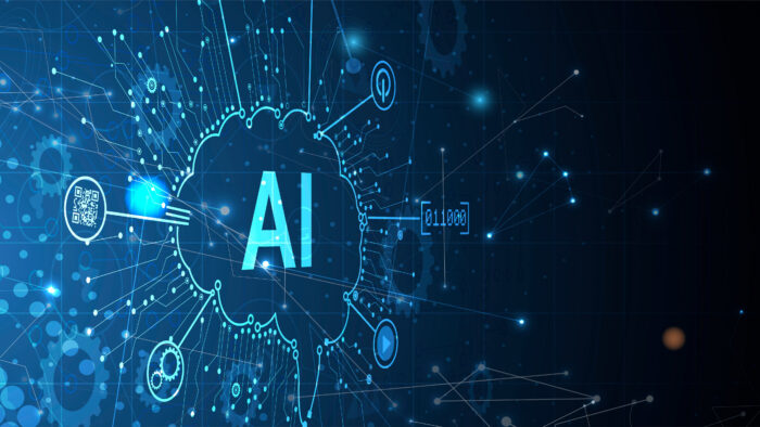 A glowing digital illustration of a human brain with the letters “AI” in the center, surrounded by circuit‑like lines, icons, and data symbols on a dark blue, high‑tech background.