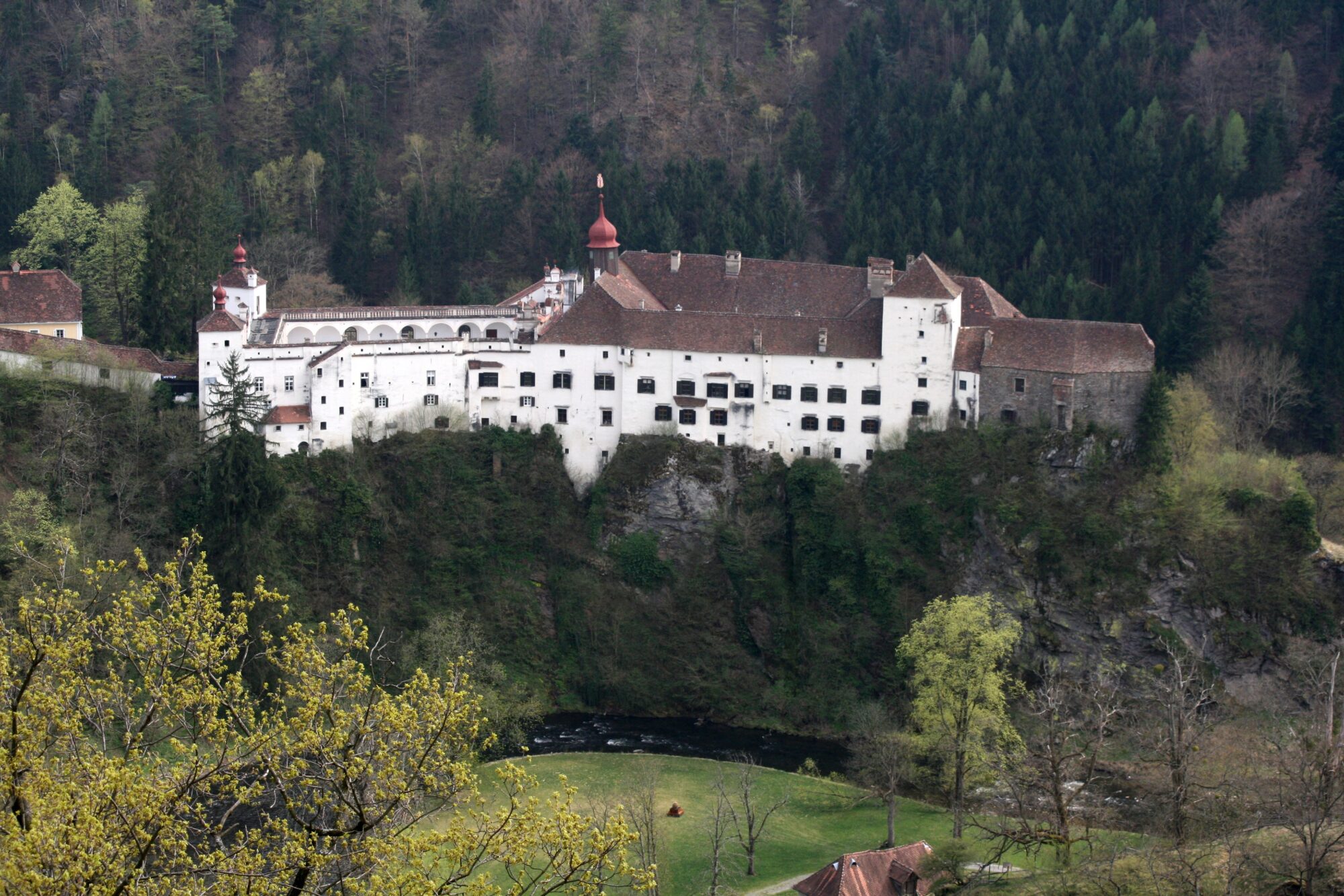 A European castle in the Austrian mountains.