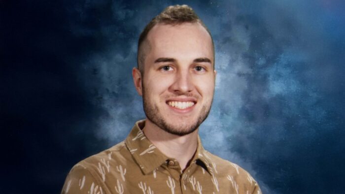 Portrait of man smiling.