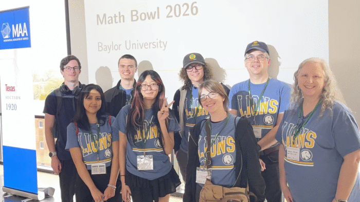 The Math Bowl team smiling for a group picture.