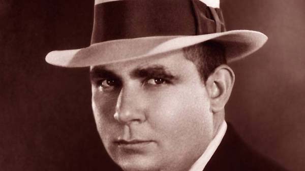 A man wearing a fedora.