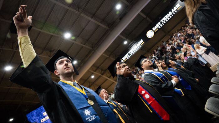 College graduates during a commencement ceremony.
