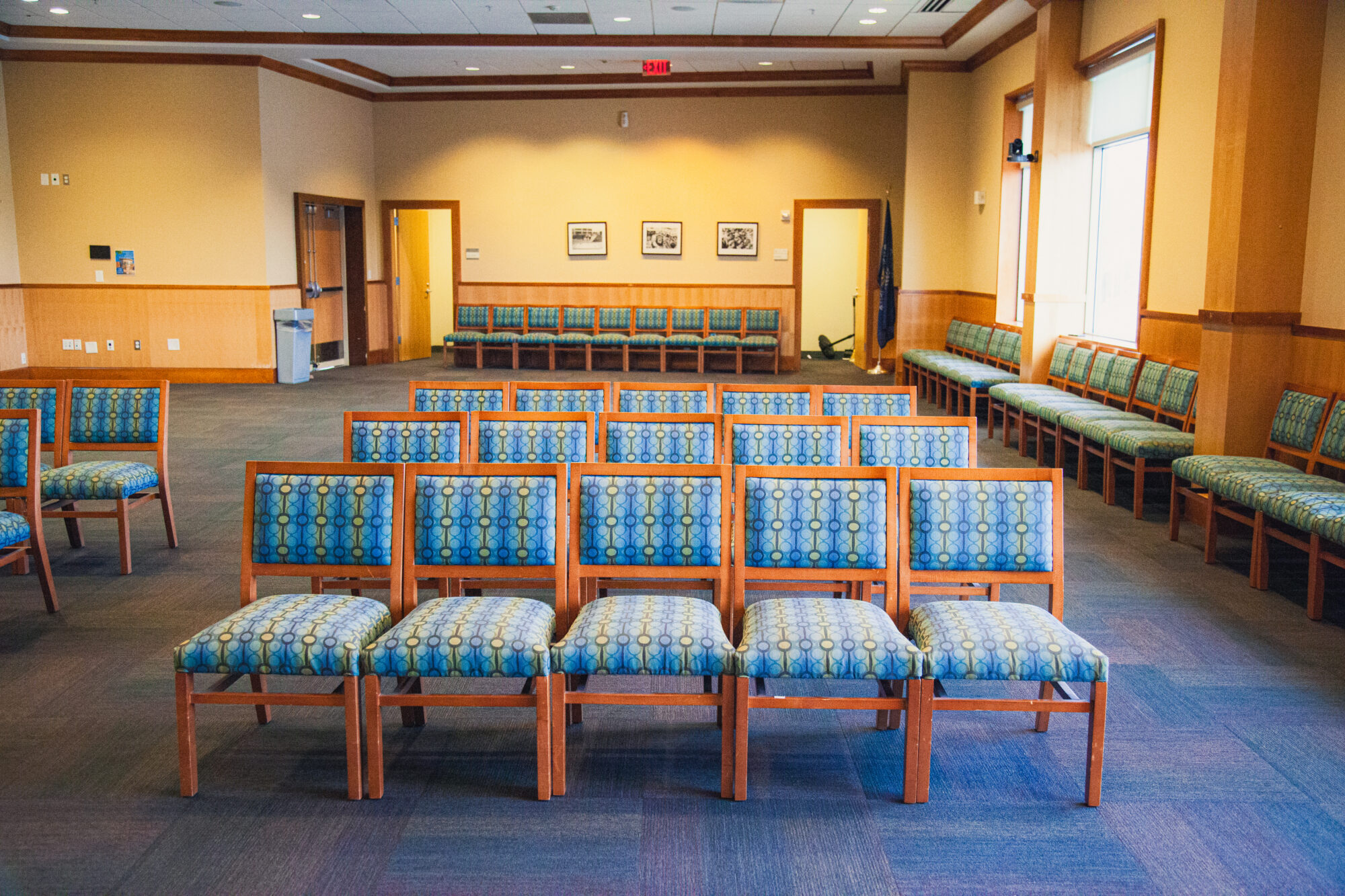 Chairs are arranged in rows, all facing the same direction toward the front.