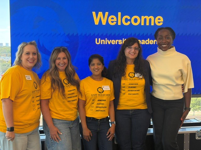 A group of people smiling