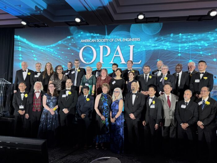 A group of people posed for a group photo for awards