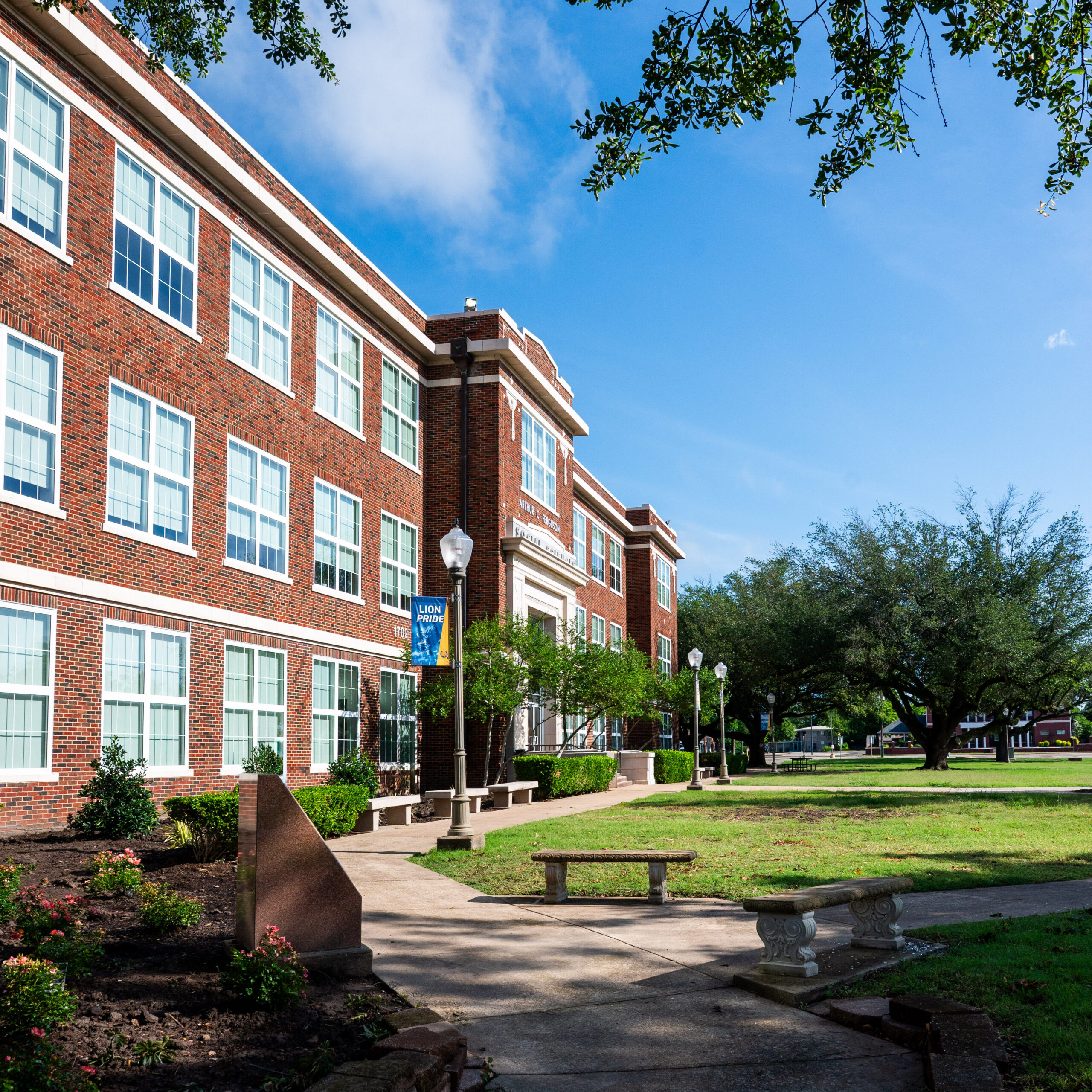 a path along a brick building